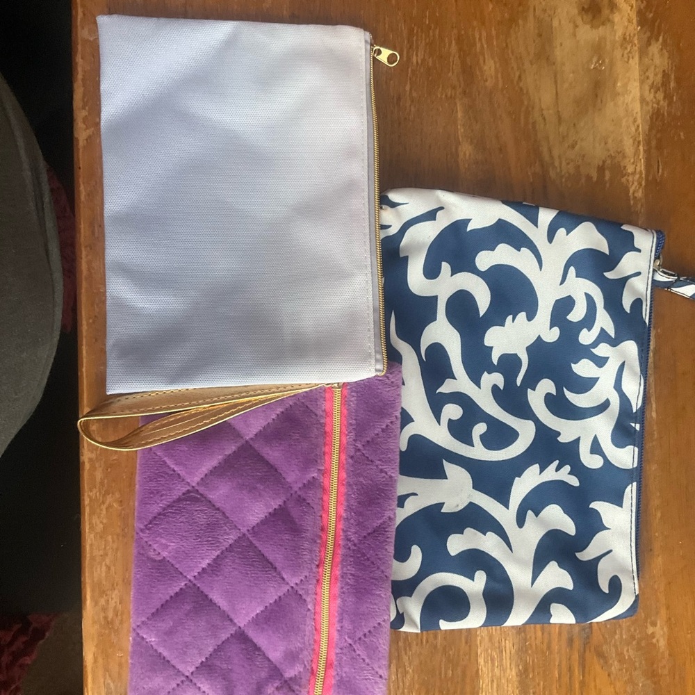 Trio of Chic Pouches in White, Purple, and Blue